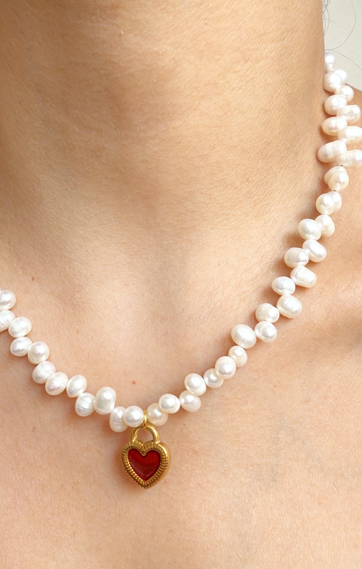 Perlas y corazón doble