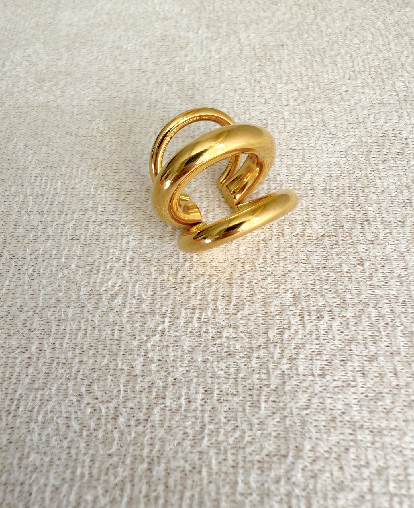 Puño de oreja en dorado
