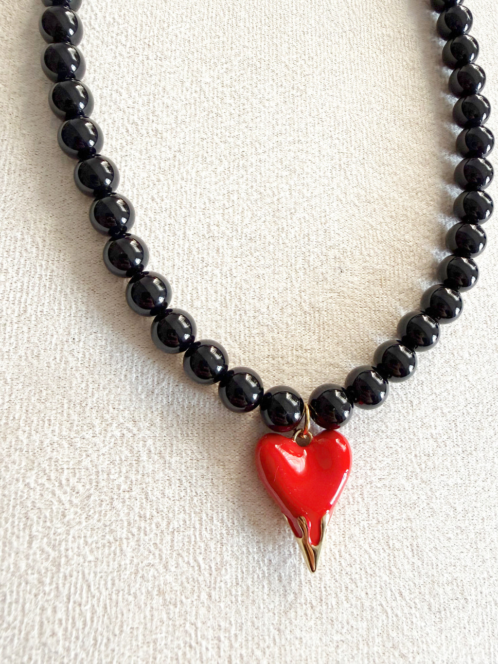 Collar latido