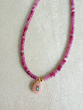 Collar facetado en magenta
