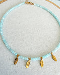 Collar facetado con golden leaves