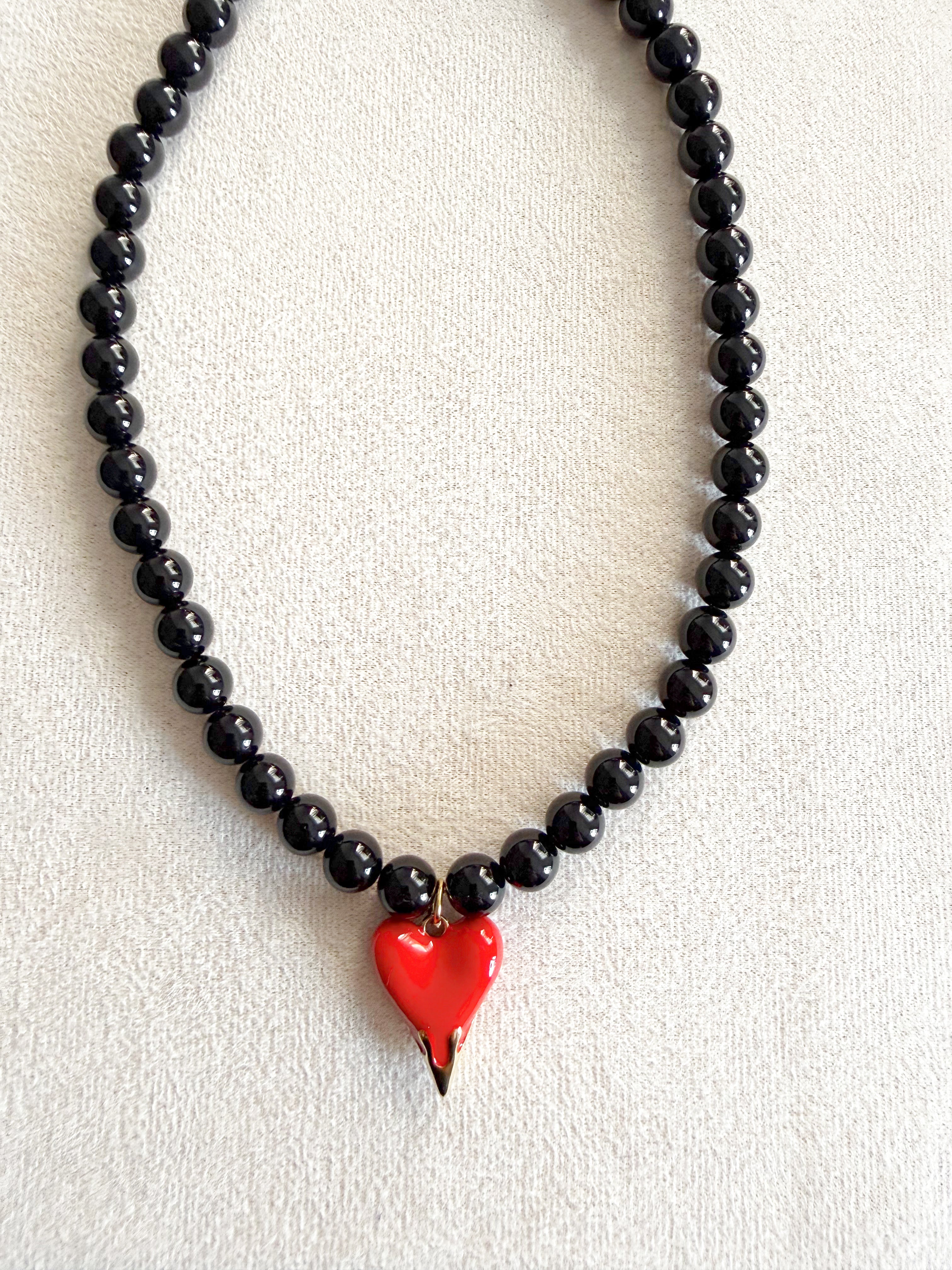 Collar latido