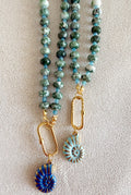 Collares de punto verde natural, con conchas en acero 100%