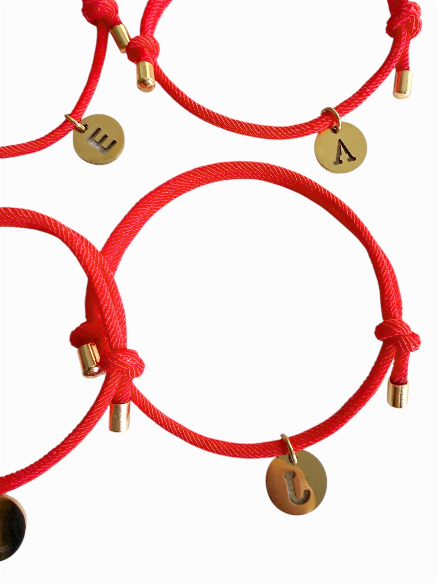Pulseras protección + inicial