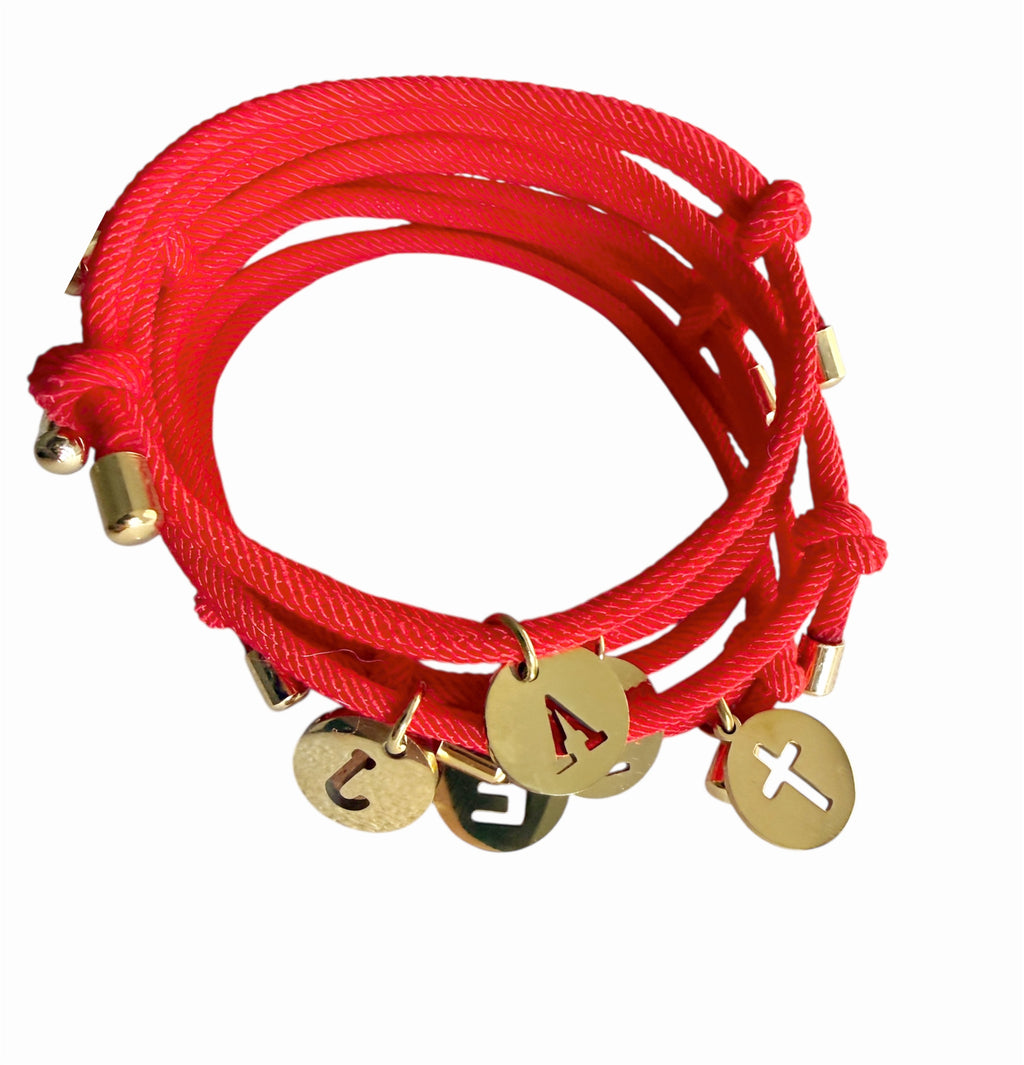 Pulseras protección + inicial