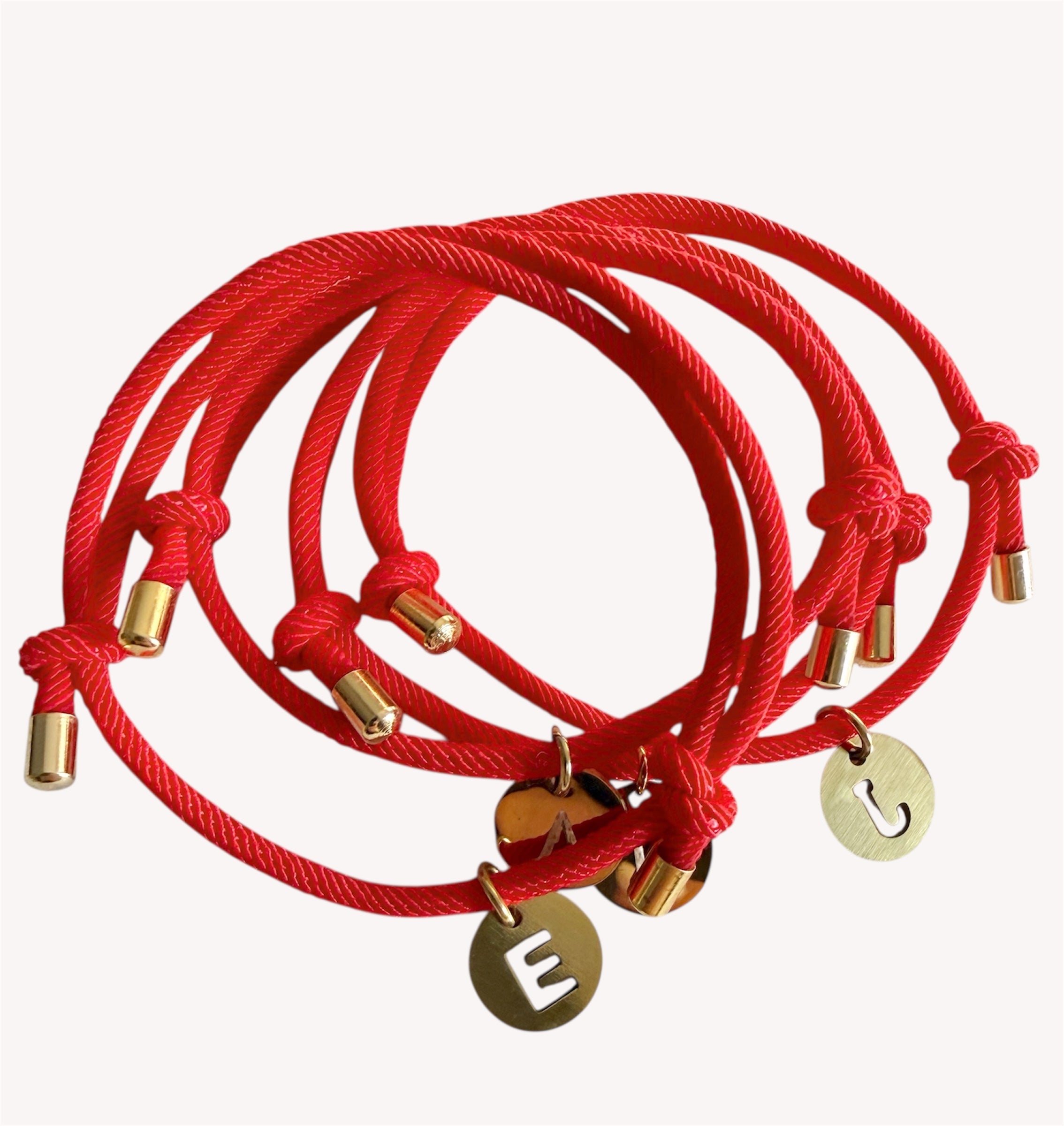 Pulseras protección + inicial