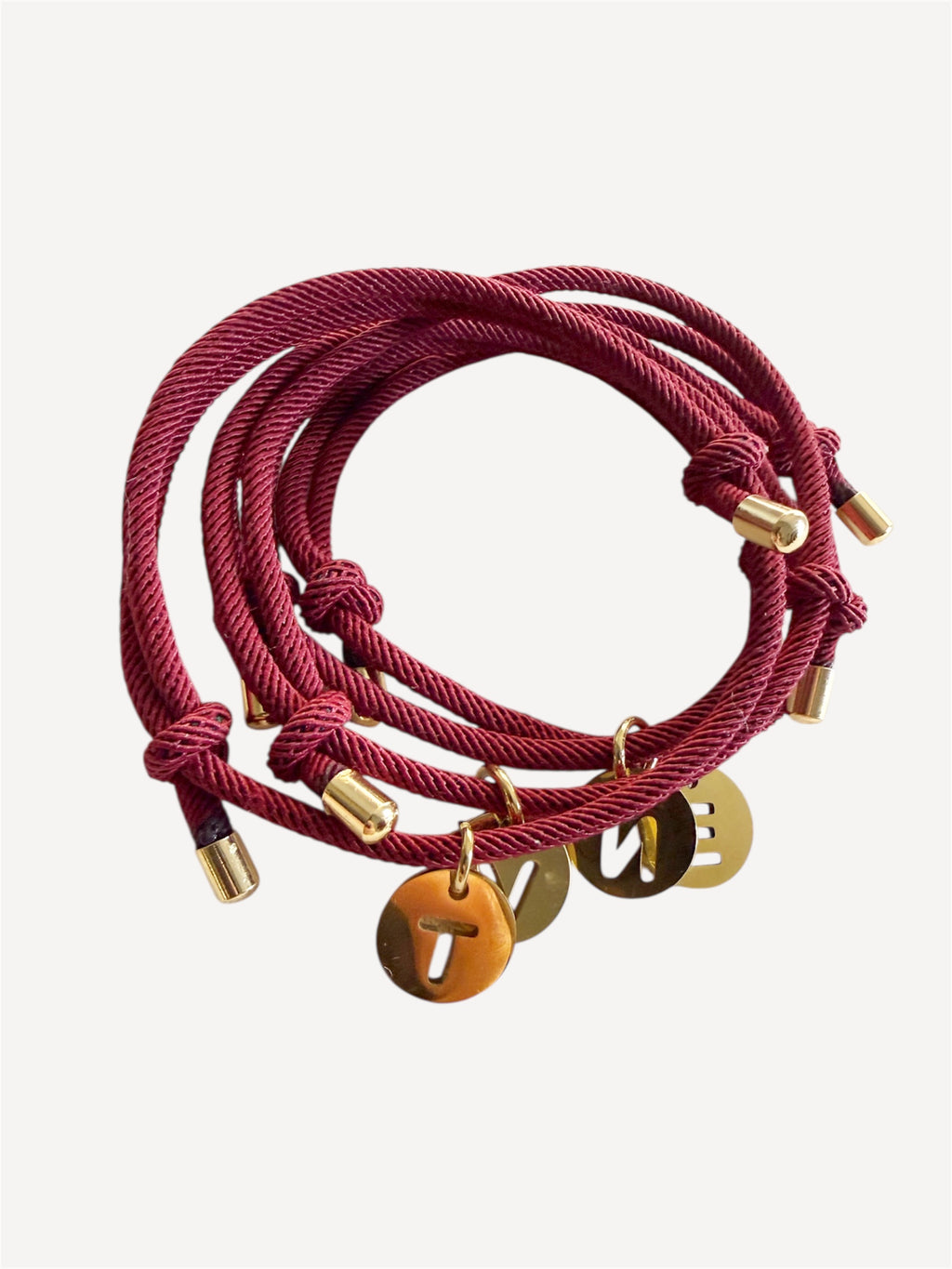 Pulseras protección + inicial