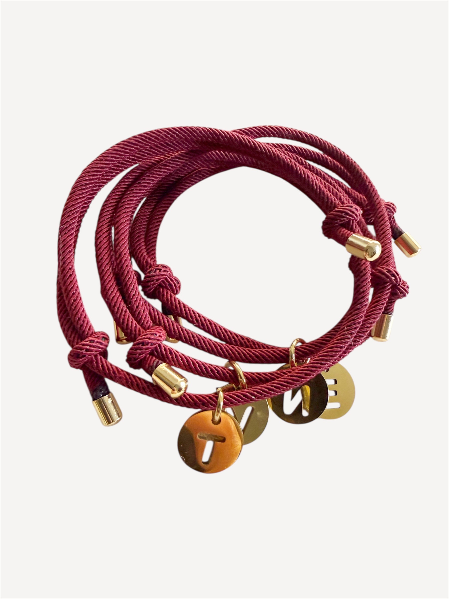 Pulseras protección + inicial