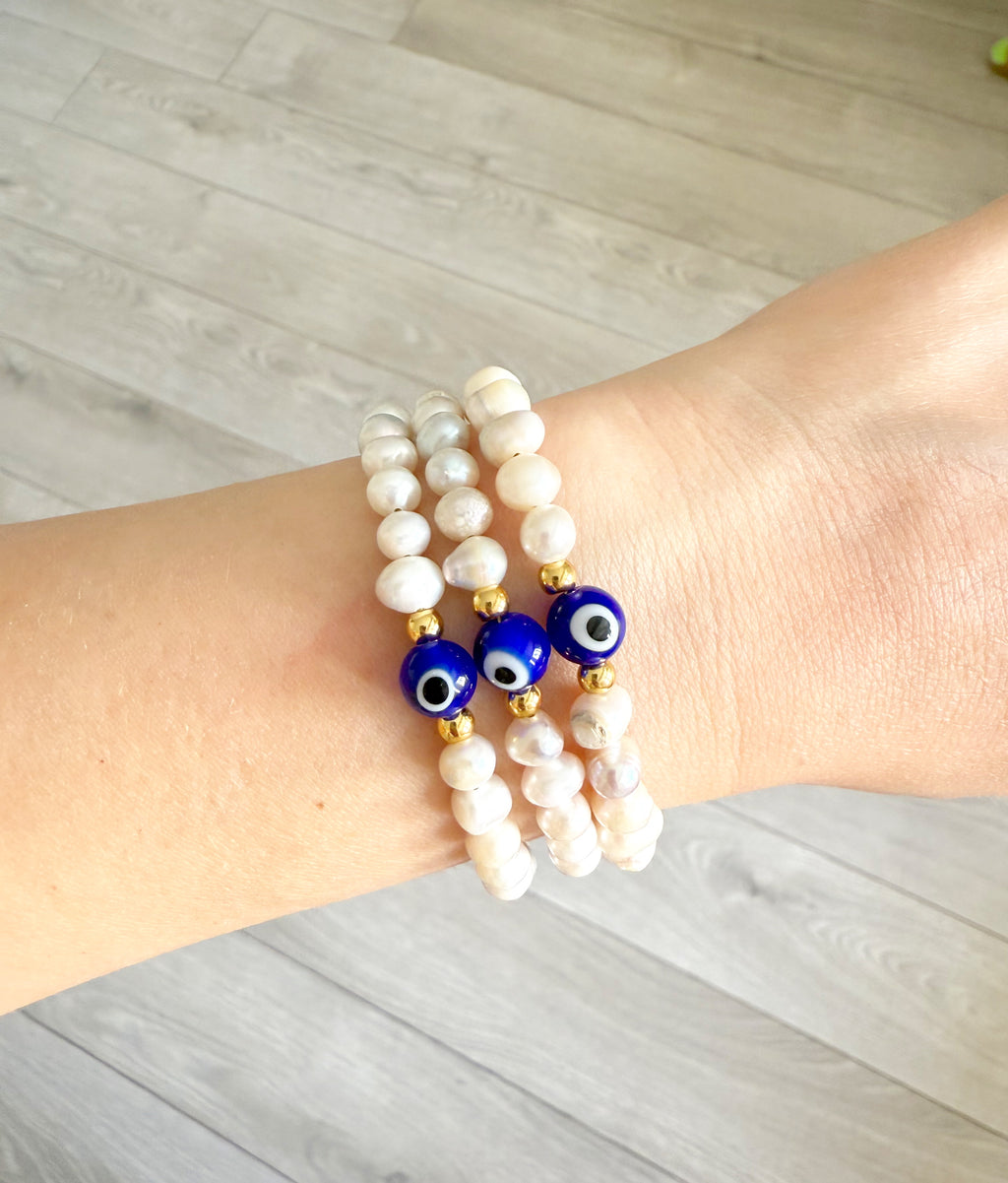 Pulsera perlas con ojo turco